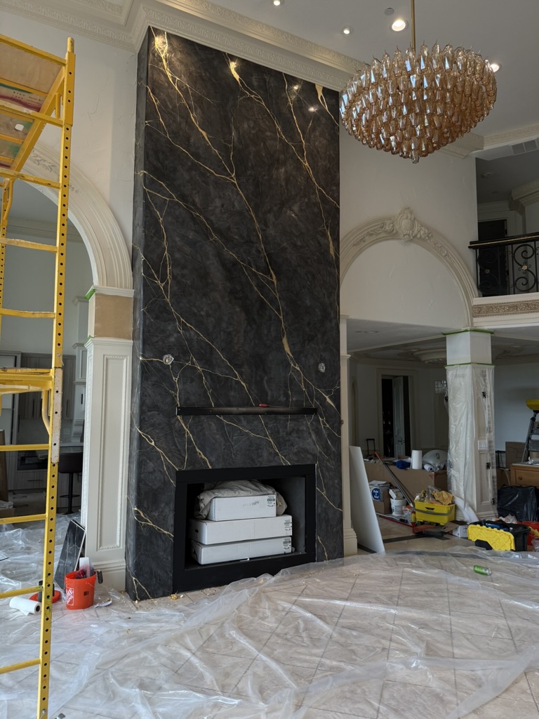 High-gloss black marble plaster with gold veining